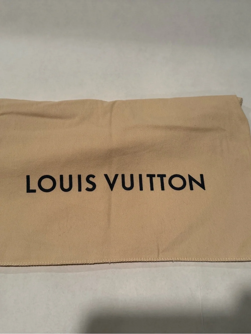 Louis Vuitton Black Pebbled Leather Messenger with LV Initials